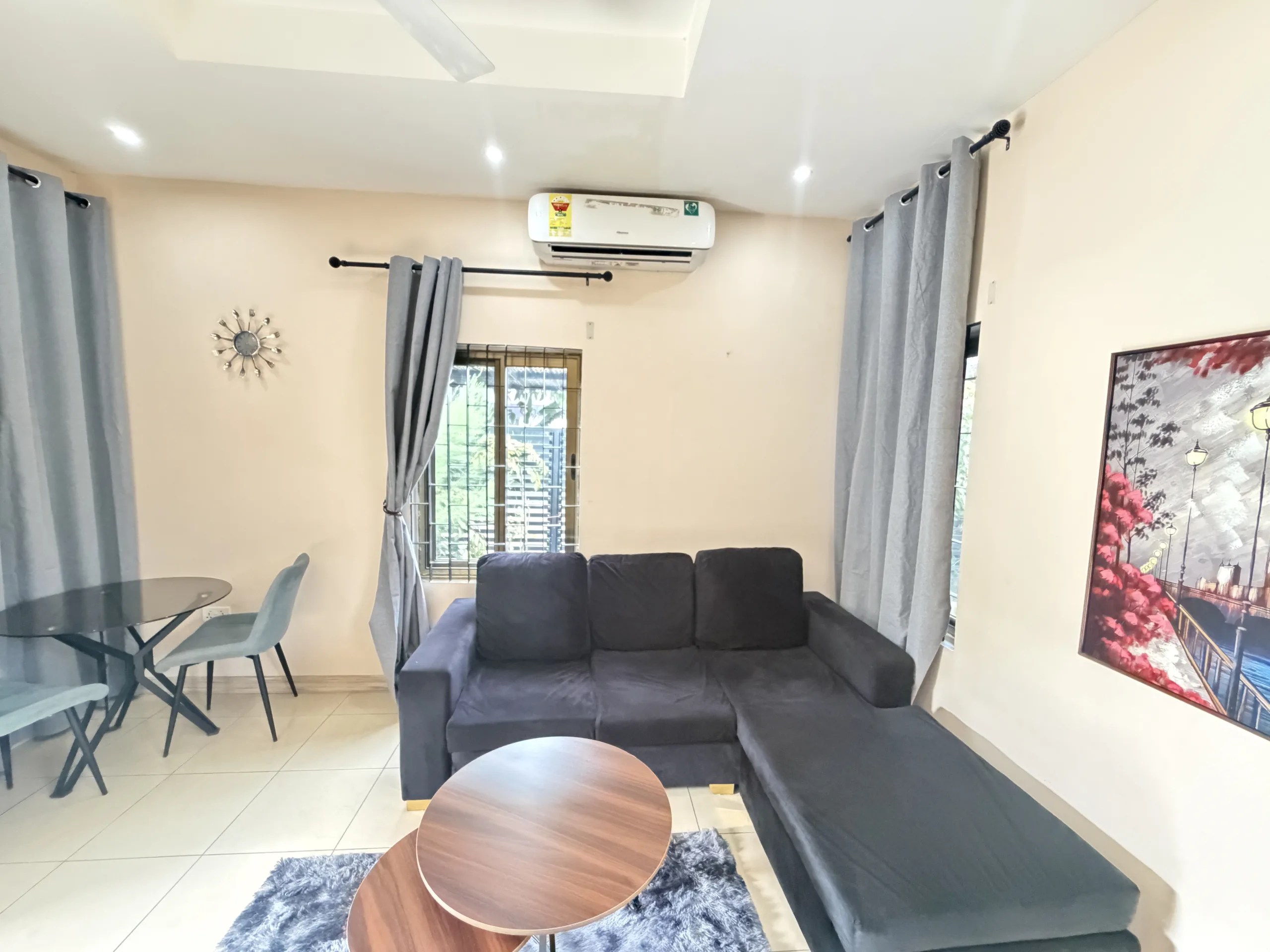 The corner sofa and dining table seen from the doorway